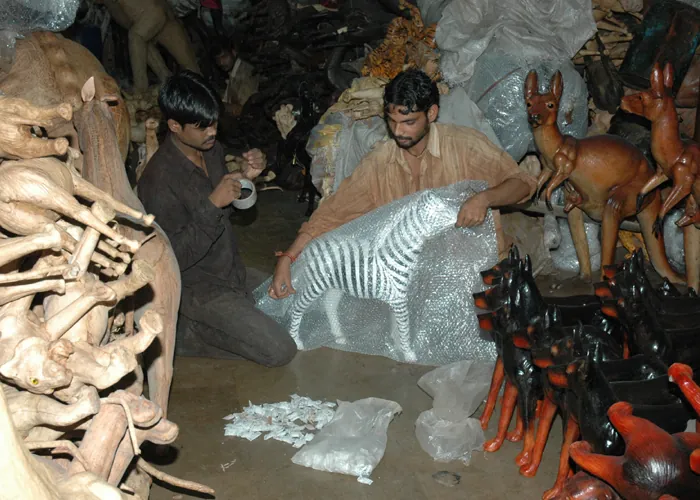 Finish & Packing: a step in handcrafting a leather animal sculpture